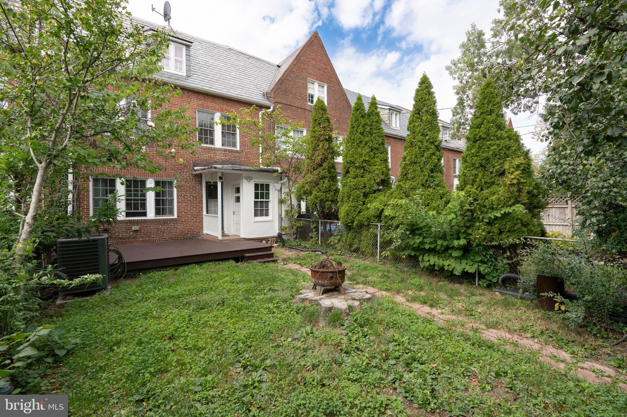3541 Newland Road Baltimore, MD 21218 - Photo 63 of 68 a front view of a house with a yard table and chairs