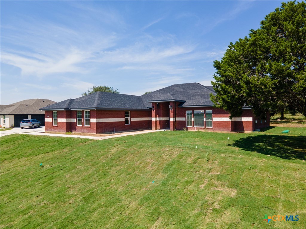 3025 Millhouse Road Copperas Cove, TX 76522 - Photo 37 of 38 a view of a house with a big yard