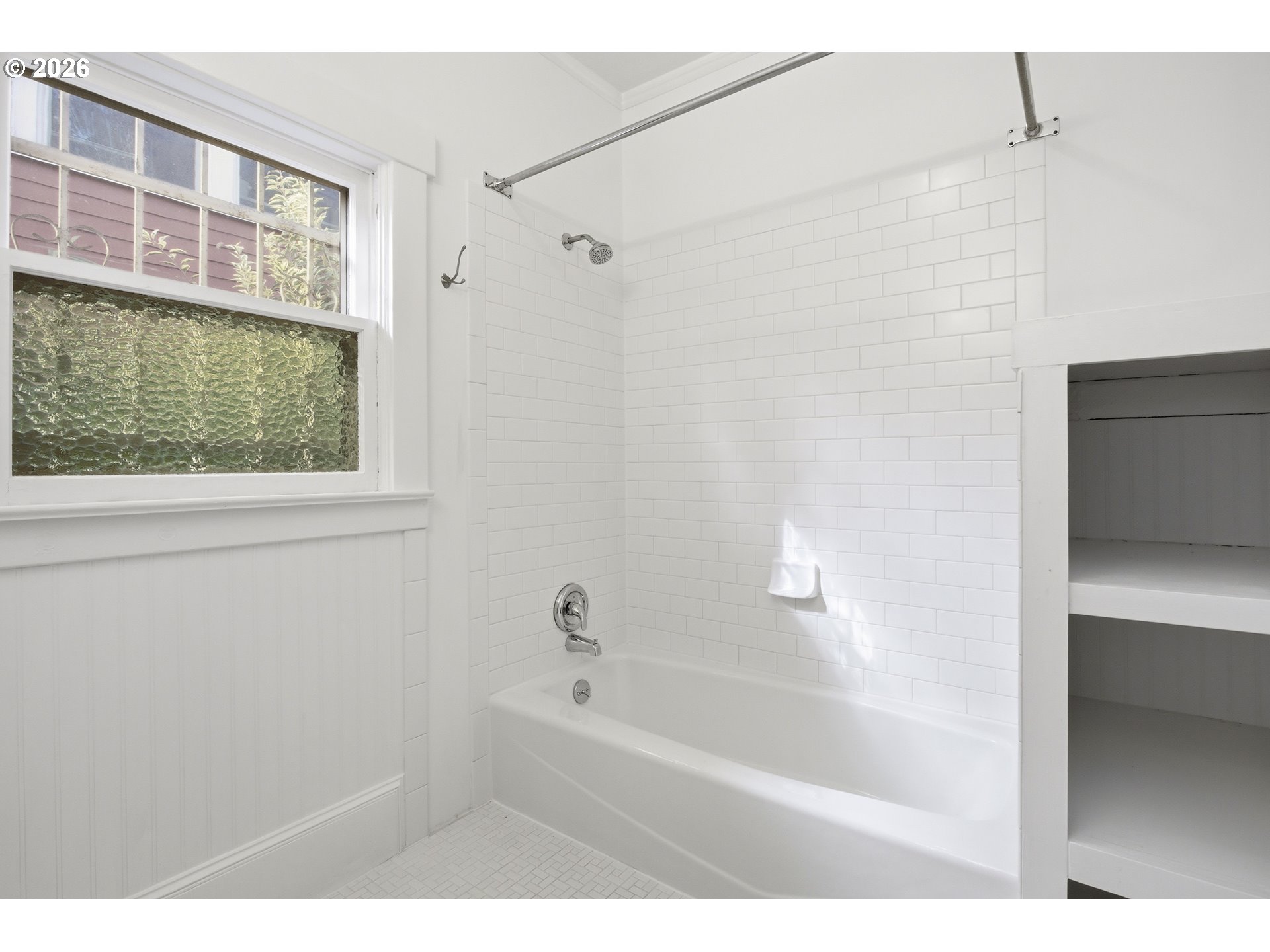 4036 Northeast Senate Street Portland, OR 97232 - Photo 12 of 48 a bathroom with a bathtub and a shower