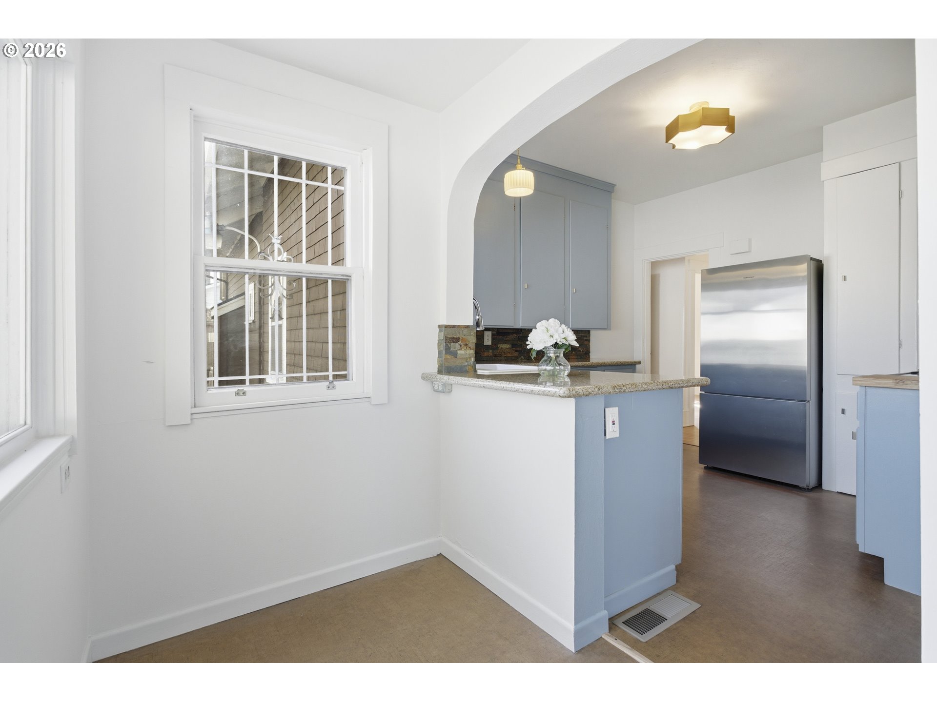 4036 Northeast Senate Street Portland, OR 97232 - Photo 20 of 48 a kitchen with a refrigerator and window
