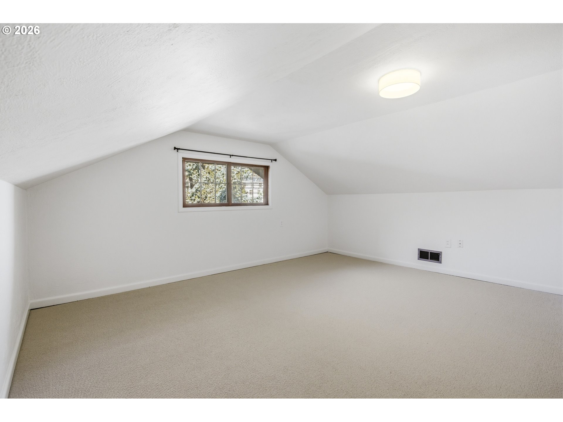 4036 Northeast Senate Street Portland, OR 97232 - Photo 22 of 48 a view of an empty room with a window