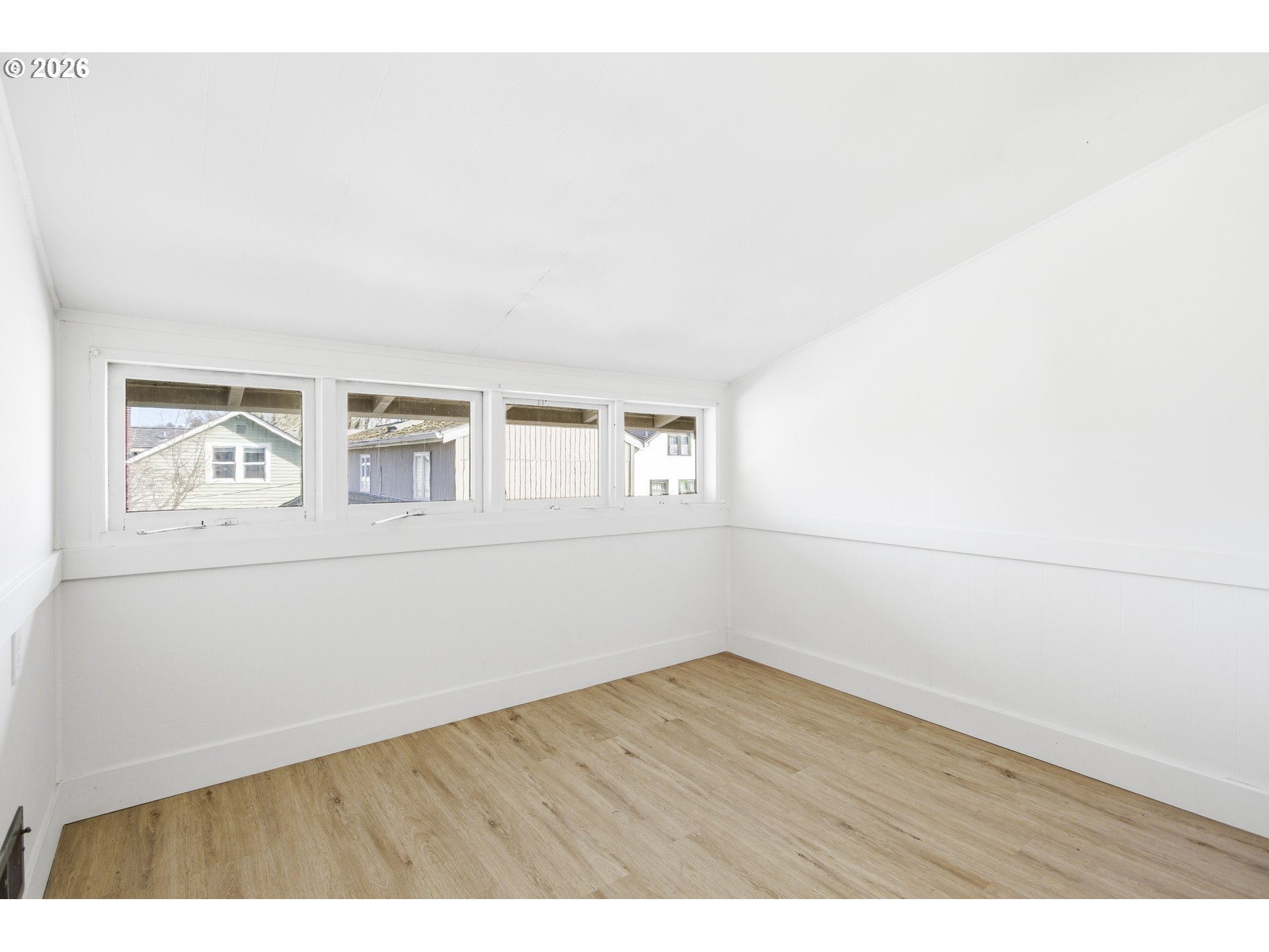 4036 Northeast Senate Street Portland, OR 97232 - Photo 23 of 48 a view of empty room with wooden floor