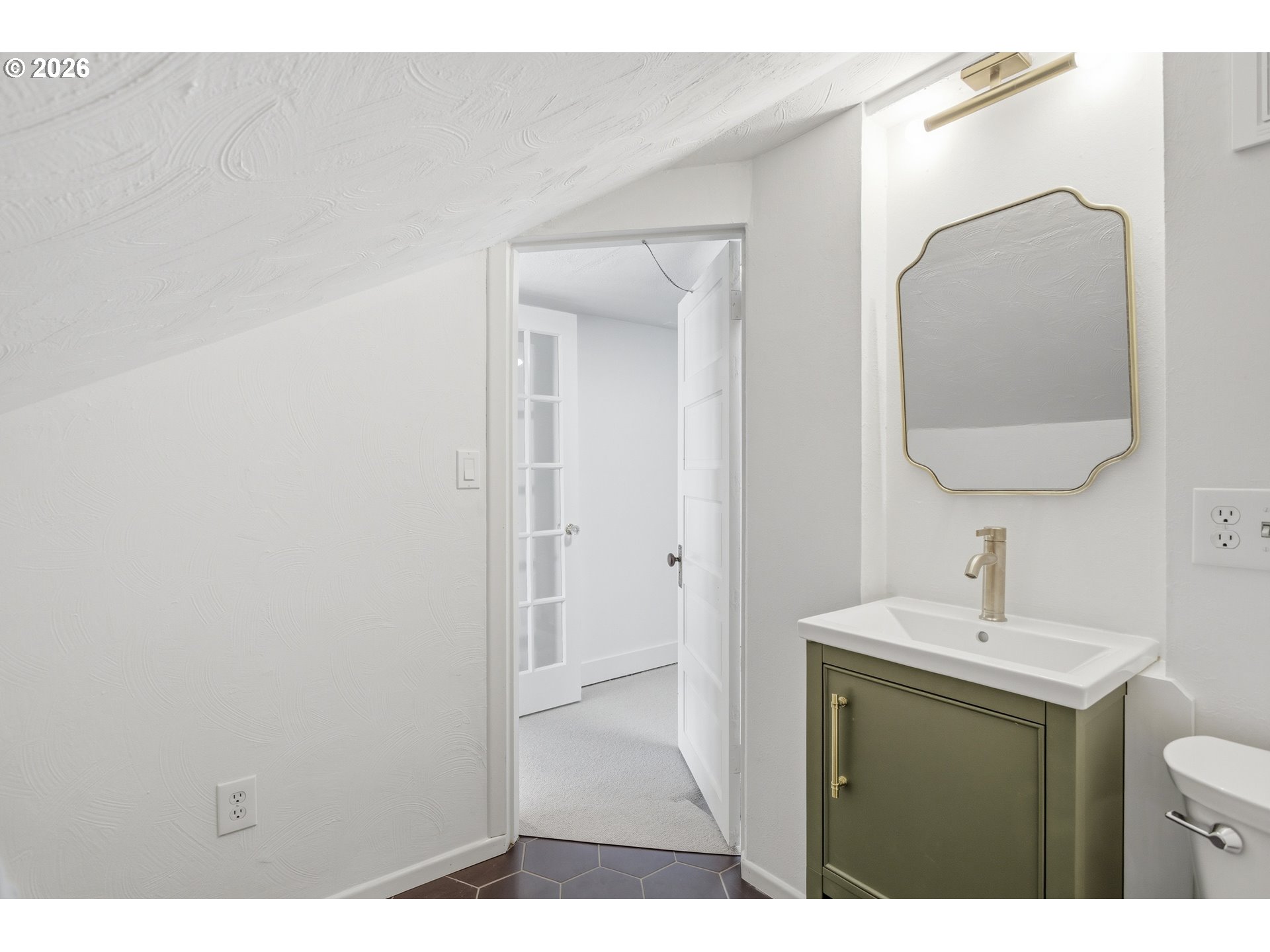 4036 Northeast Senate Street Portland, OR 97232 - Photo 24 of 48 a bathroom with a sink vanity and a mirror