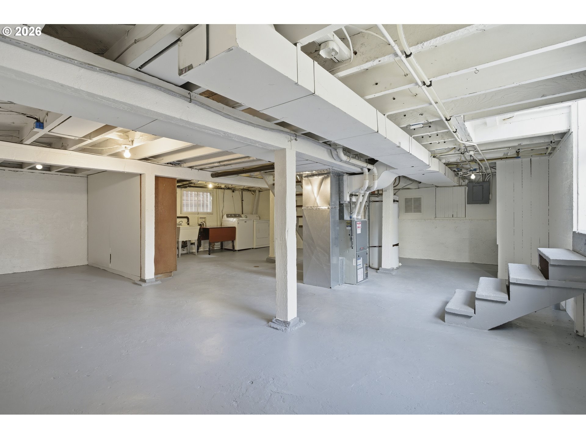 4036 Northeast Senate Street Portland, OR 97232 - Photo 26 of 48 a view of hallway with furniture and a chandelier