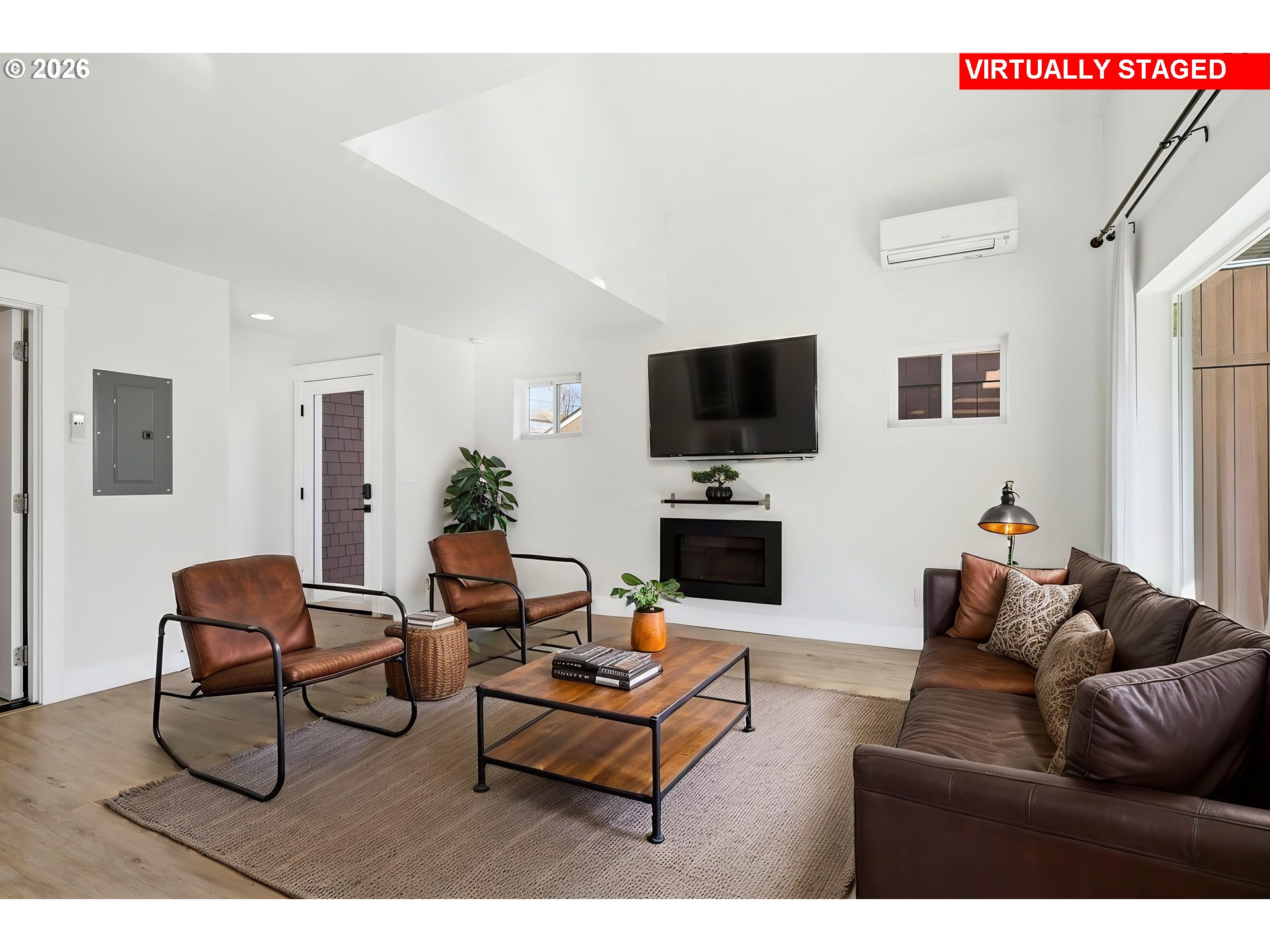 4036 Northeast Senate Street Portland, OR 97232 - Photo 32 of 48 a living room with furniture and a flat screen tv