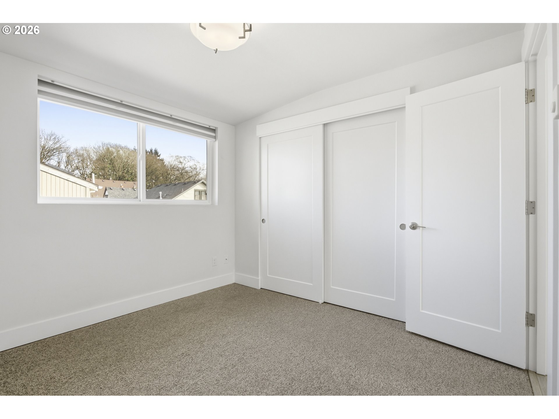4036 Northeast Senate Street Portland, OR 97232 - Photo 34 of 48 a view of an empty room with a window