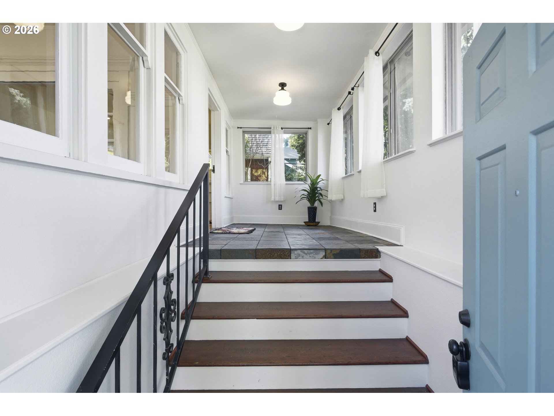 4036 Northeast Senate Street Portland, OR 97232 - Photo 4 of 48 a view of entryway and hall with wooden floor