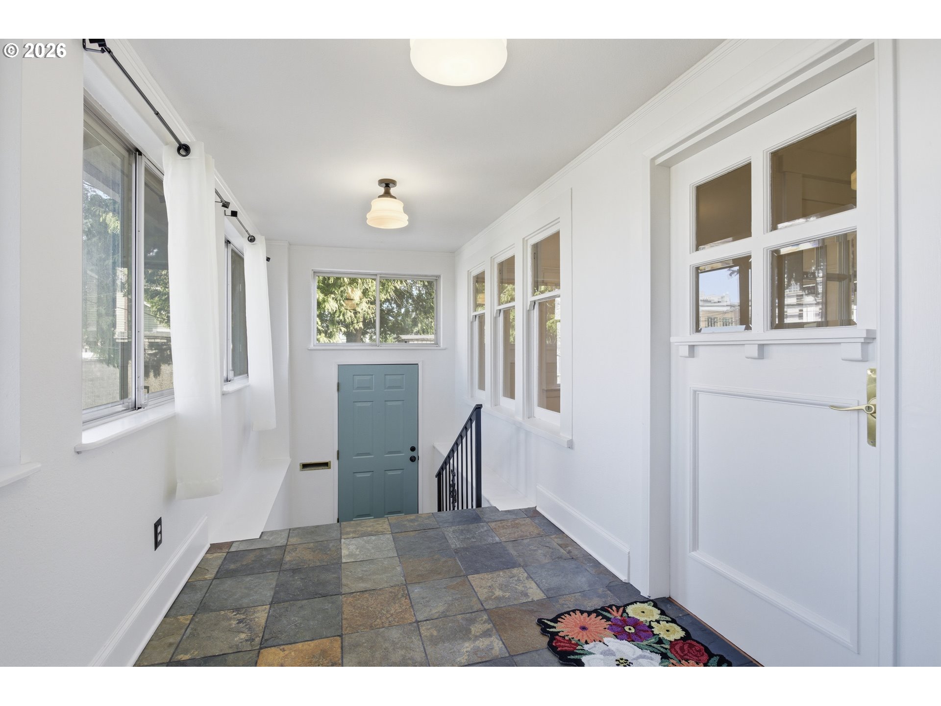 4036 Northeast Senate Street Portland, OR 97232 - Photo 5 of 48 a view interior of a house with wooden floor and windows