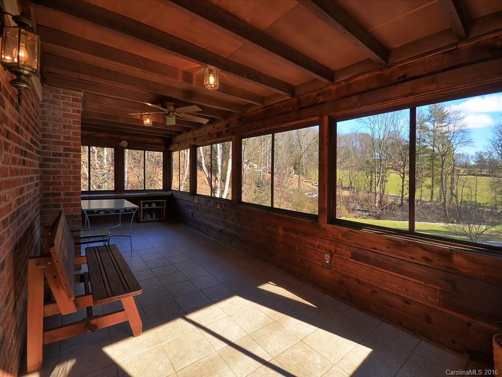 326 Robinson Road Clyde, NC 28721 - Photo 15 of 20 a view of a room with wooden floor