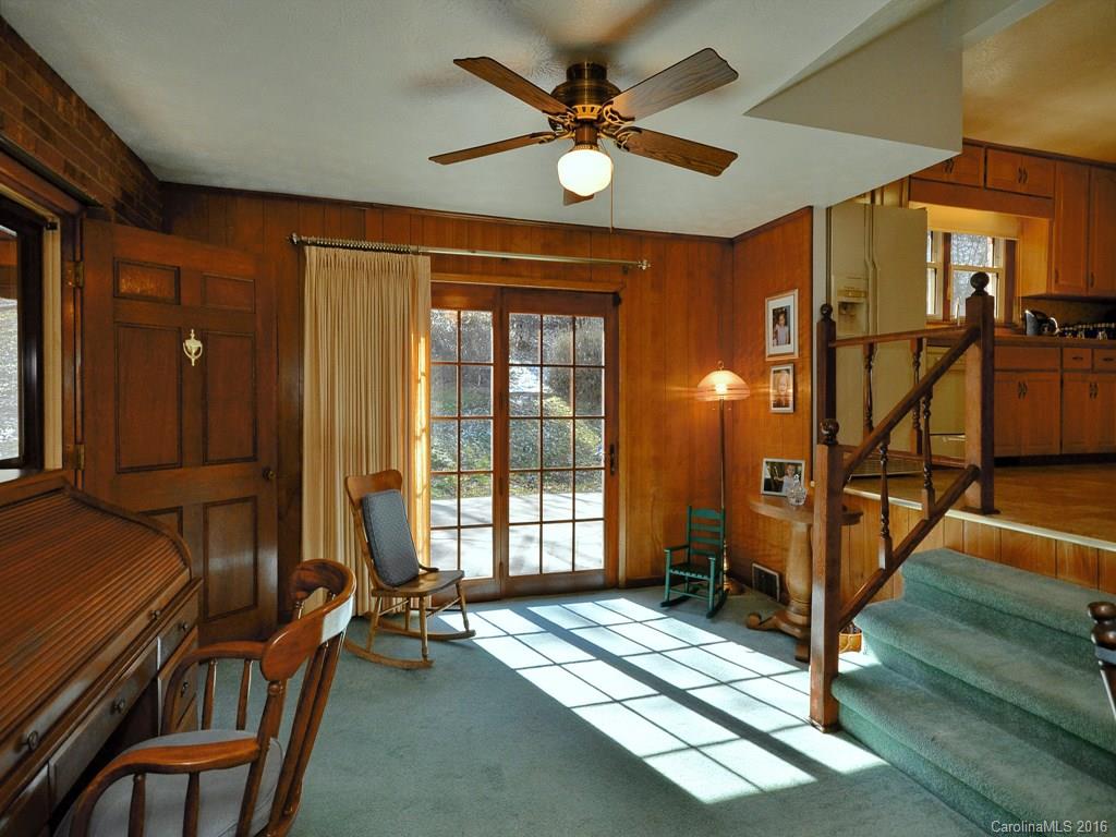 326 Robinson Road Clyde, NC 28721 - Photo 5 of 20 a view of an entryway with wooden floor