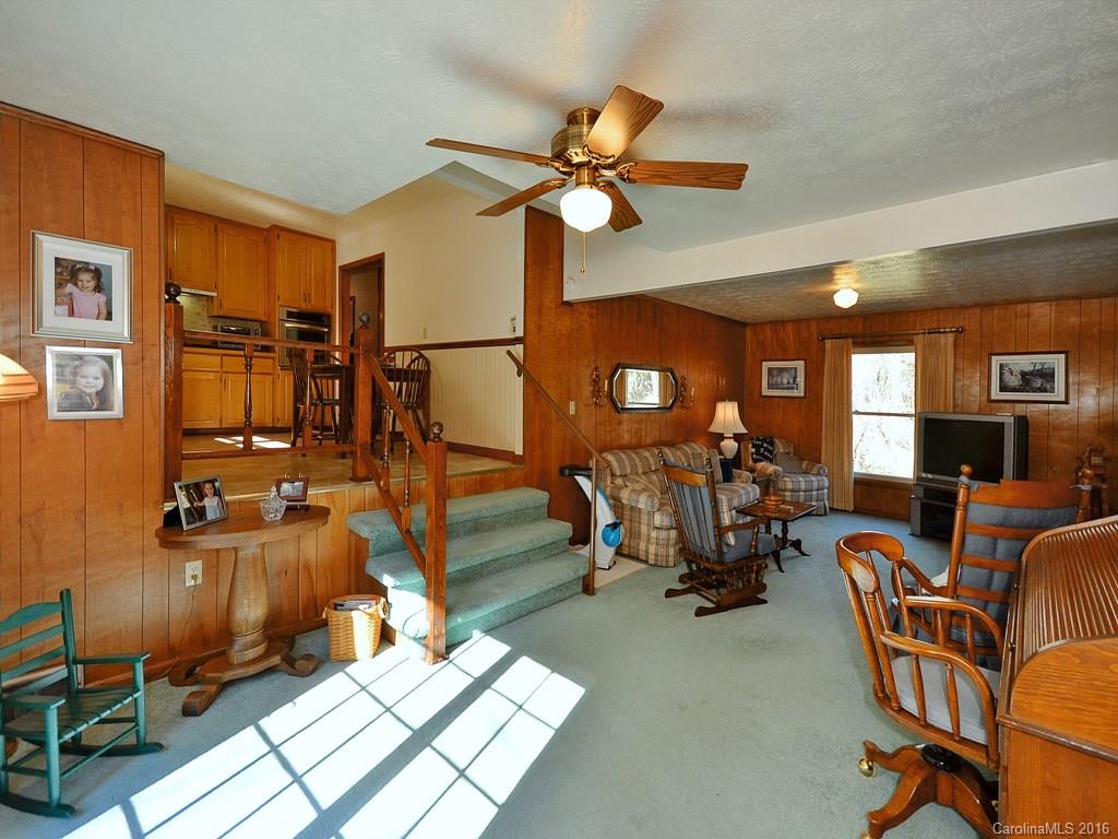 326 Robinson Road Clyde, NC 28721 - Photo 7 of 20 a view of a livingroom with furniture and a window