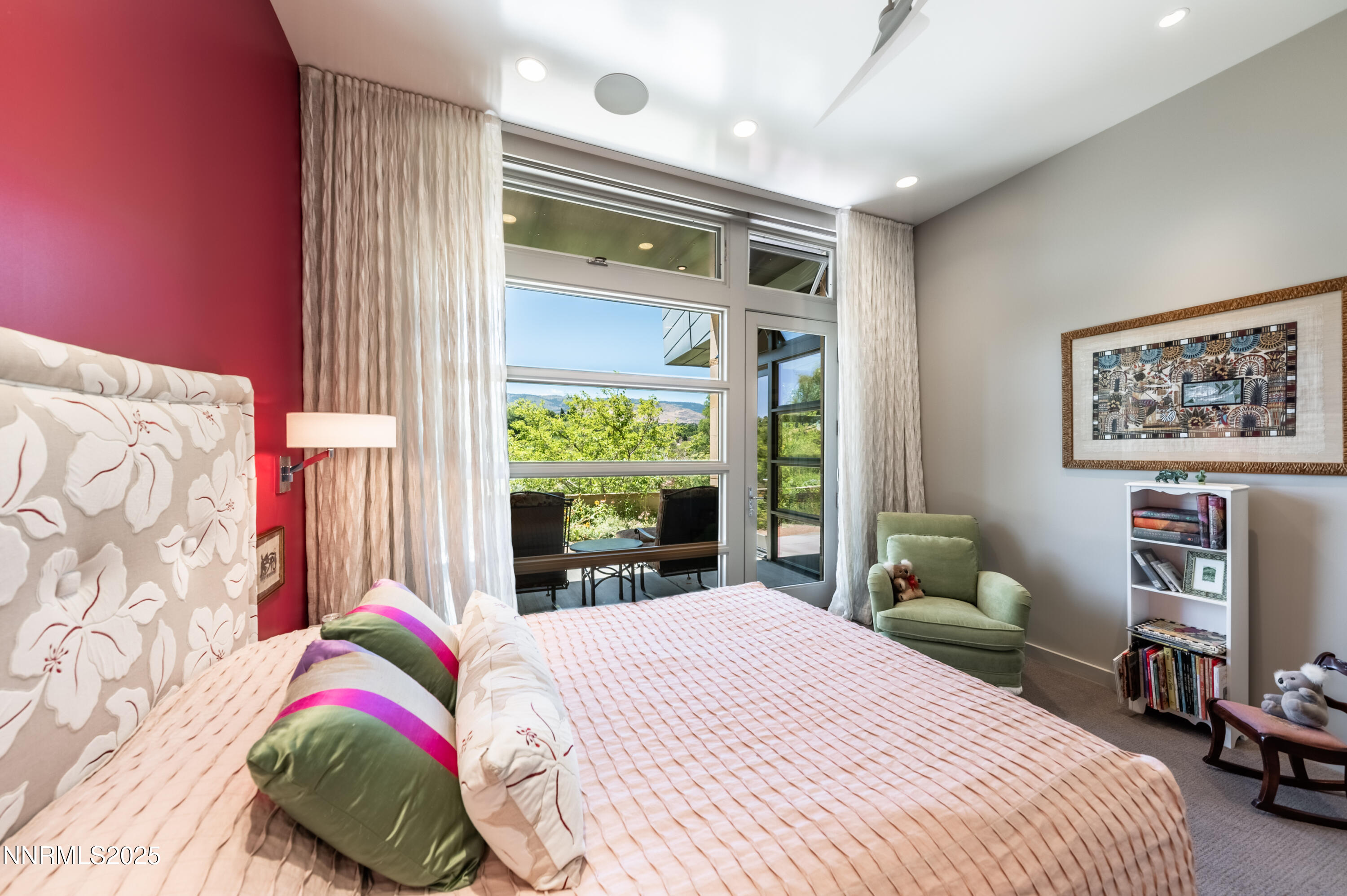 2345 Crescent Circle Reno, NV 89509 - Photo 23 of 37 a bedroom with a bed and a large window