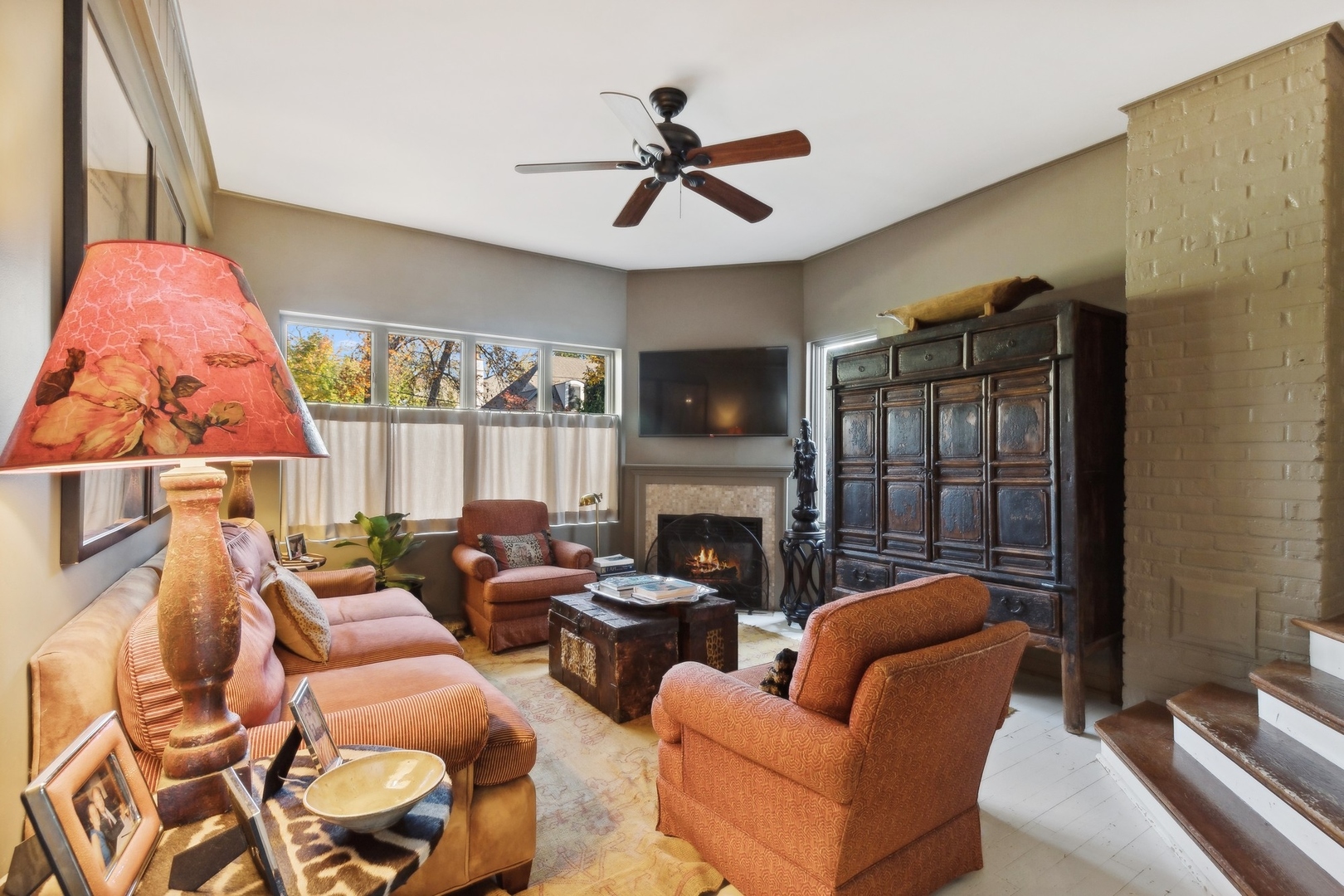 666 Maple Avenue Lake Bluff, IL 60044 - Photo 26 of 41 a living room with furniture fireplace and a large window