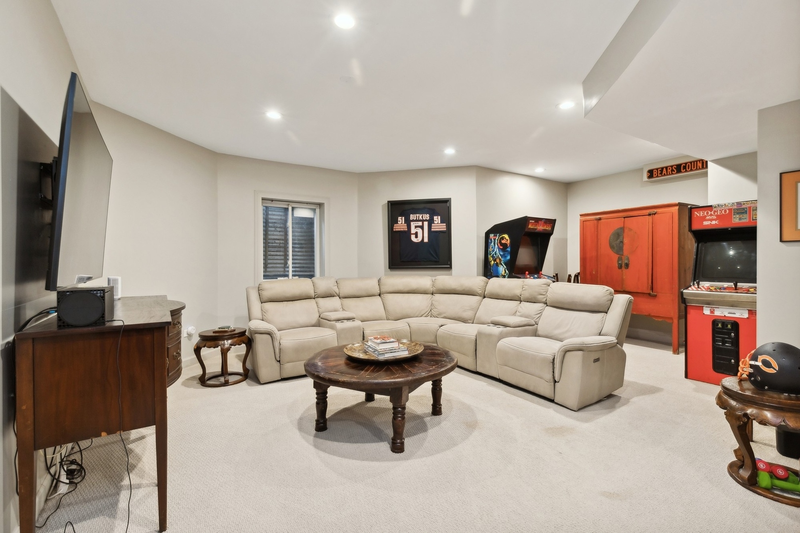 666 Maple Avenue Lake Bluff, IL 60044 - Photo 29 of 41 a living room with furniture and a flat screen tv