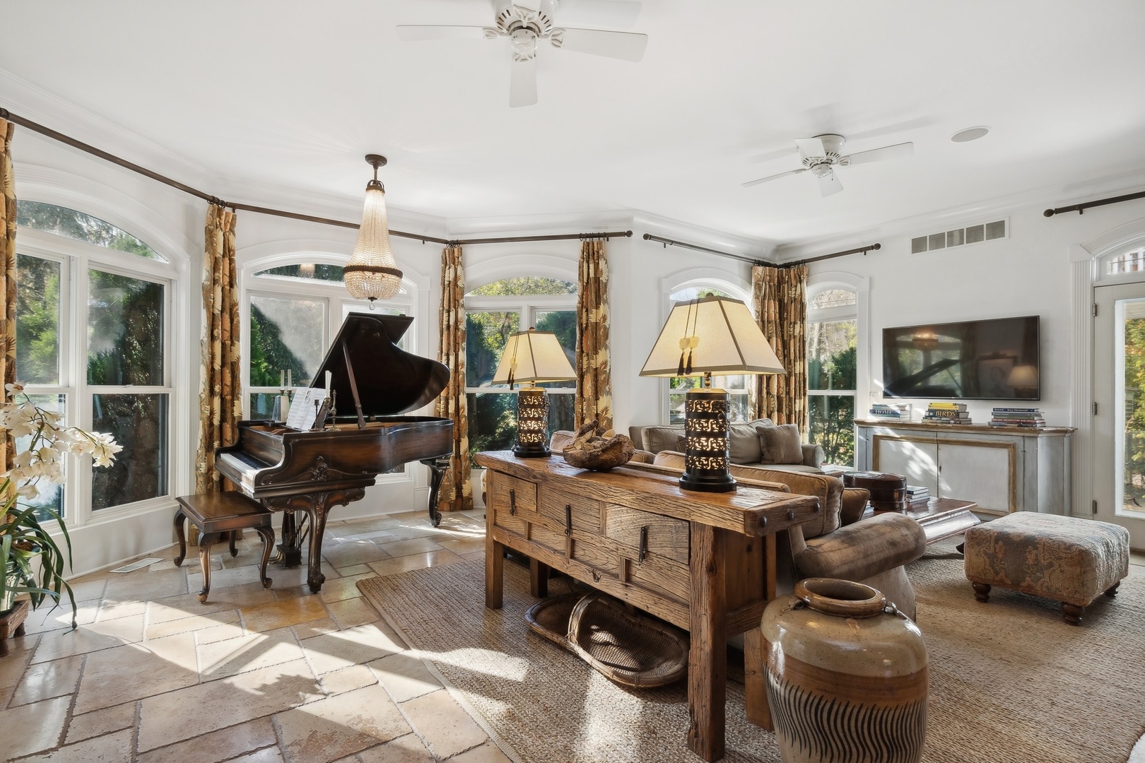 666 Maple Avenue Lake Bluff, IL 60044 - Photo 8 of 41 a living room with furniture gym equipment and a large window