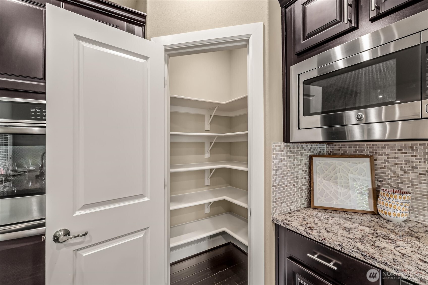 4114 174th Street Southeast Bothell, WA 98012 - Photo 16 of 40 a hallway with washer and dryer