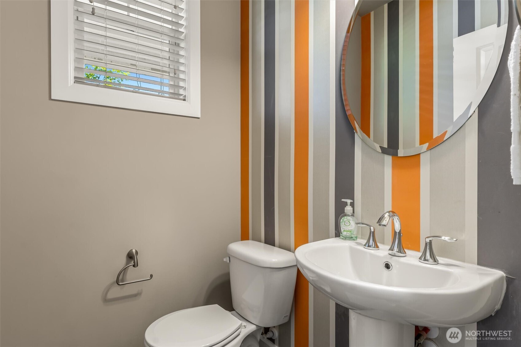 4114 174th Street Southeast Bothell, WA 98012 - Photo 17 of 40 a bathroom with a sink and a mirror