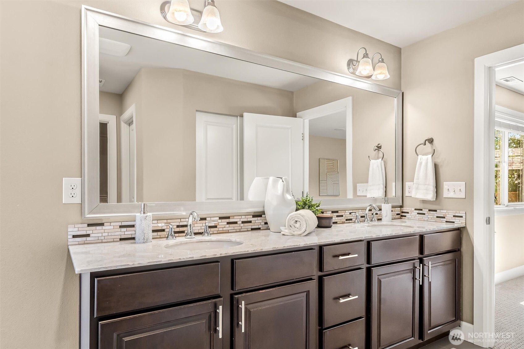 4114 174th Street Southeast Bothell, WA 98012 - Photo 25 of 40 a bathroom with a sink and a mirror