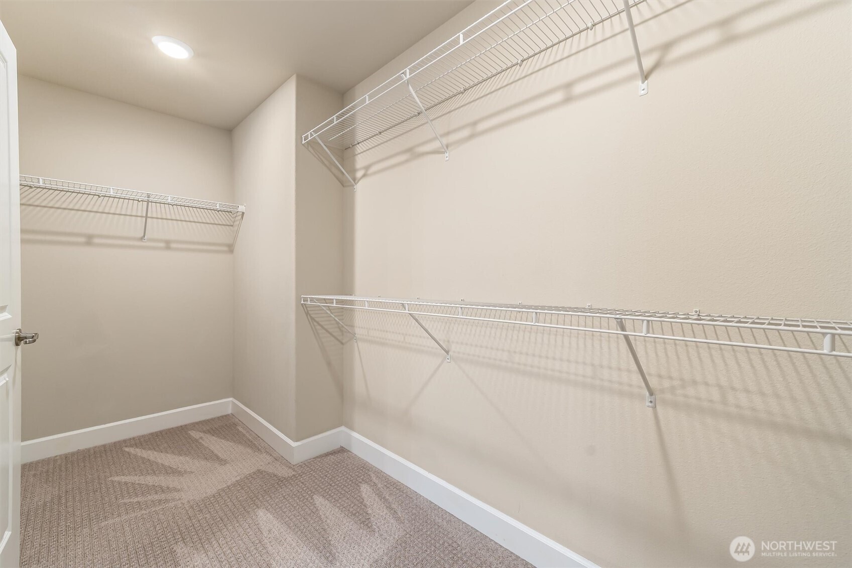 4114 174th Street Southeast Bothell, WA 98012 - Photo 26 of 40 a view of a room with racks on the wall