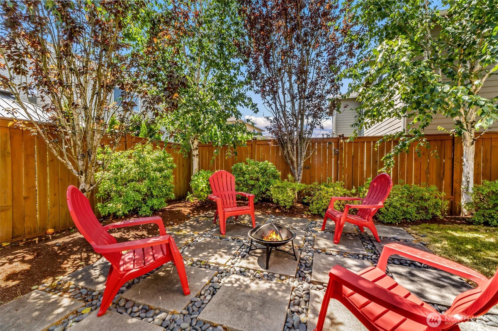 4114 174th Street Southeast Bothell, WA 98012 - Photo 33 of 40 a backyard of a house with outdoor seating