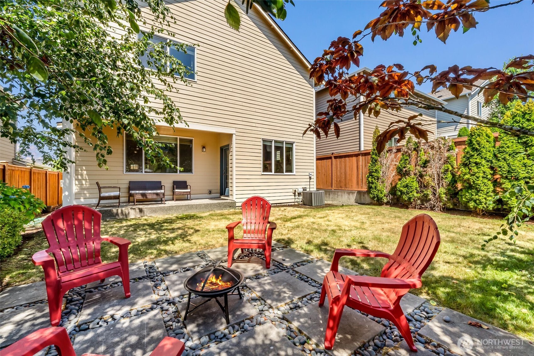 4114 174th Street Southeast Bothell, WA 98012 - Photo 34 of 40 a backyard of a house with outdoor seating