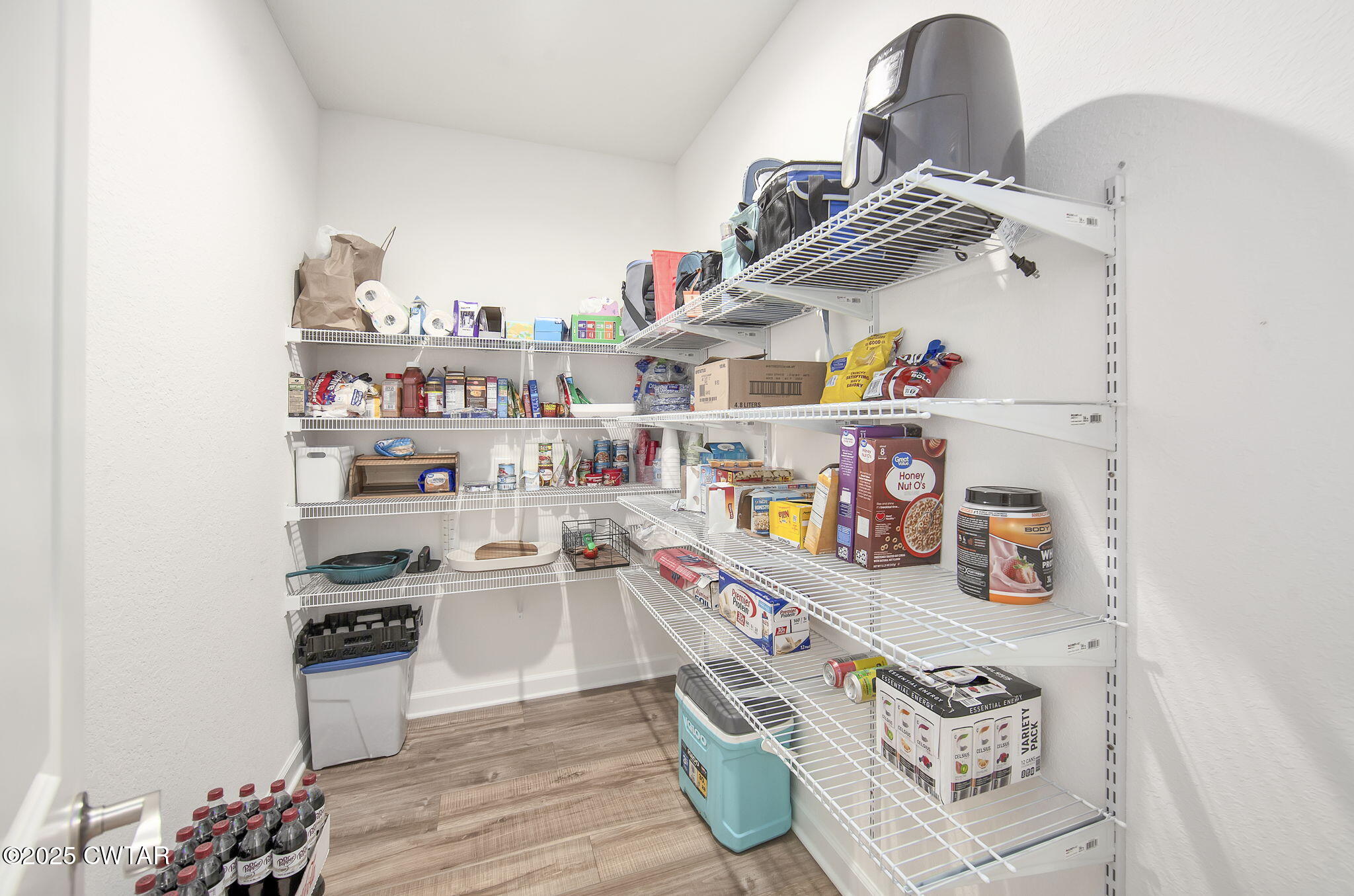 240 Greystone Cv Street Henderson, TN 38340 - Photo 30 of 64 a kitchen with stainless steel appliances granite countertop a lot of clutter on the wall and cabinets