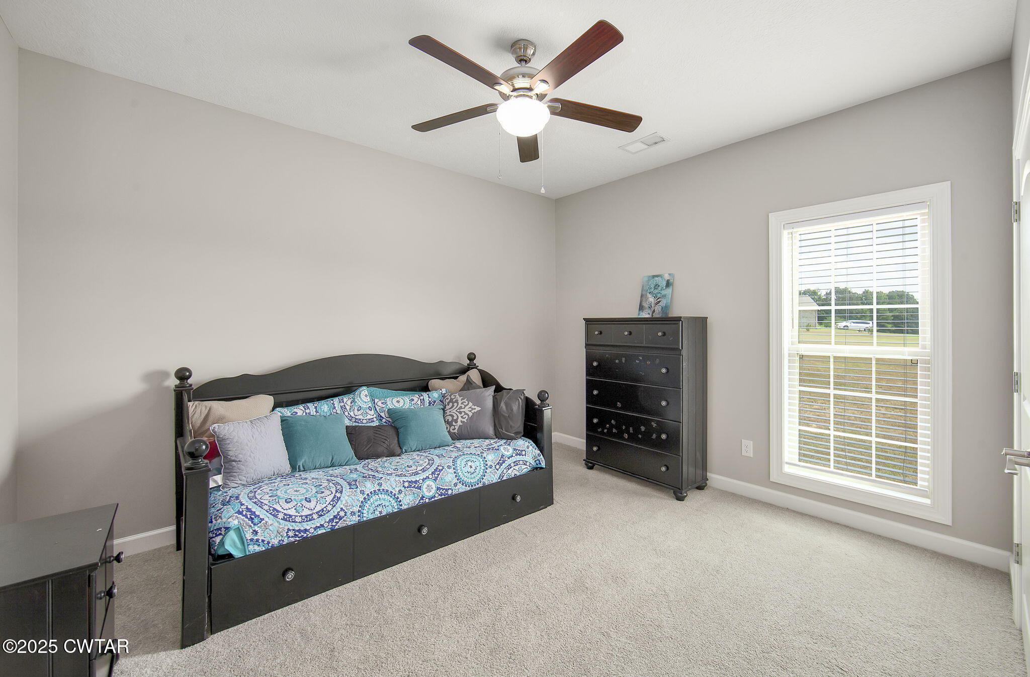 240 Greystone Cv Street Henderson, TN 38340 - Photo 31 of 64 a living room with furniture and a fireplace