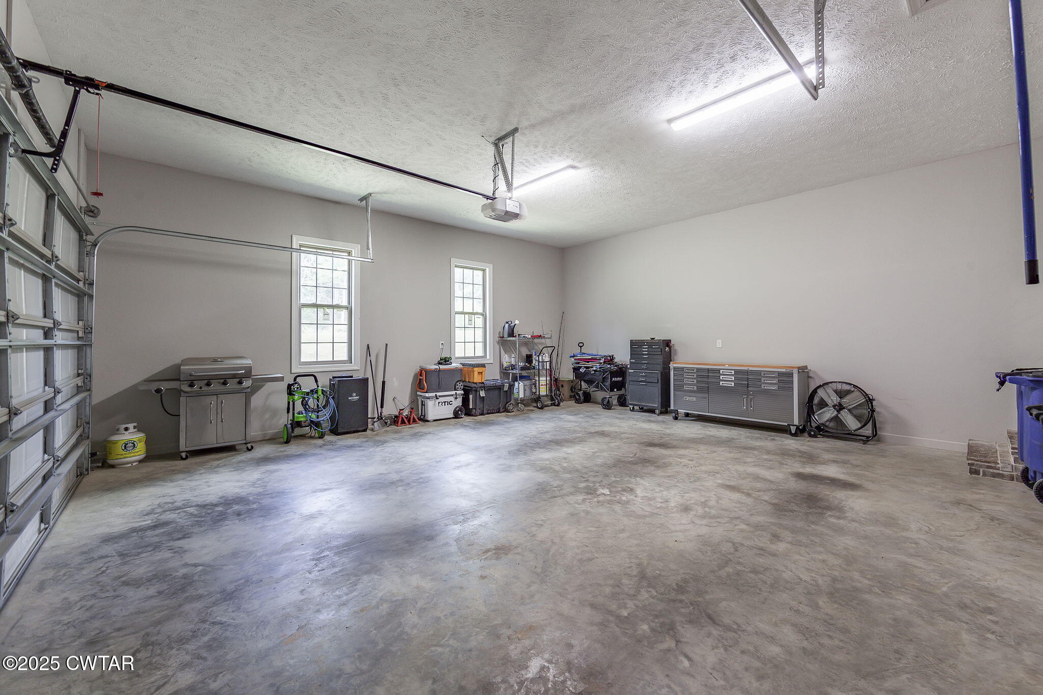 240 Greystone Cv Street Henderson, TN 38340 - Photo 34 of 64 a view of a livingroom with furniture and windows in a room