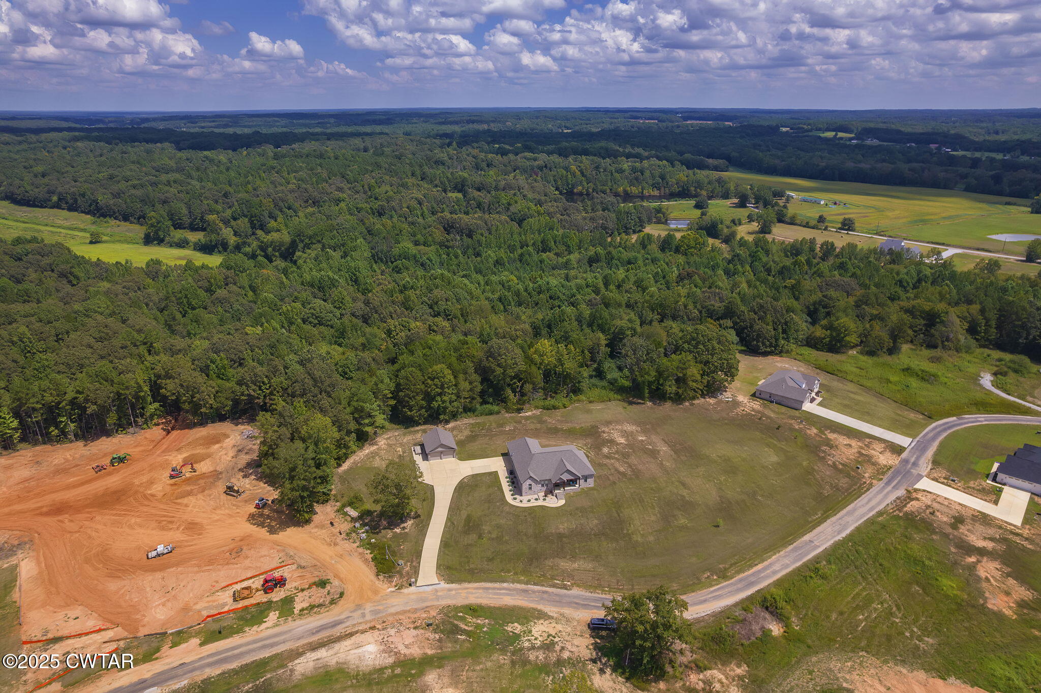 240 Greystone Cv Street Henderson, TN 38340 - Photo 48 of 64 a view of a swimming pool with a yard and a garden