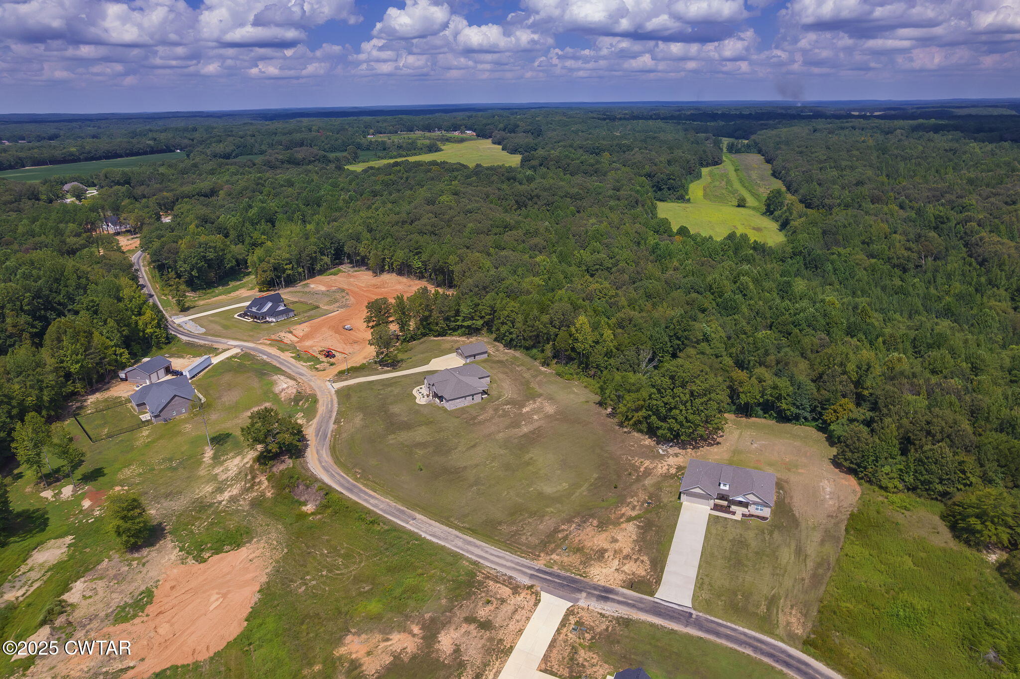 240 Greystone Cv Street Henderson, TN 38340 - Photo 51 of 64 an aerial view of a house with a yard
