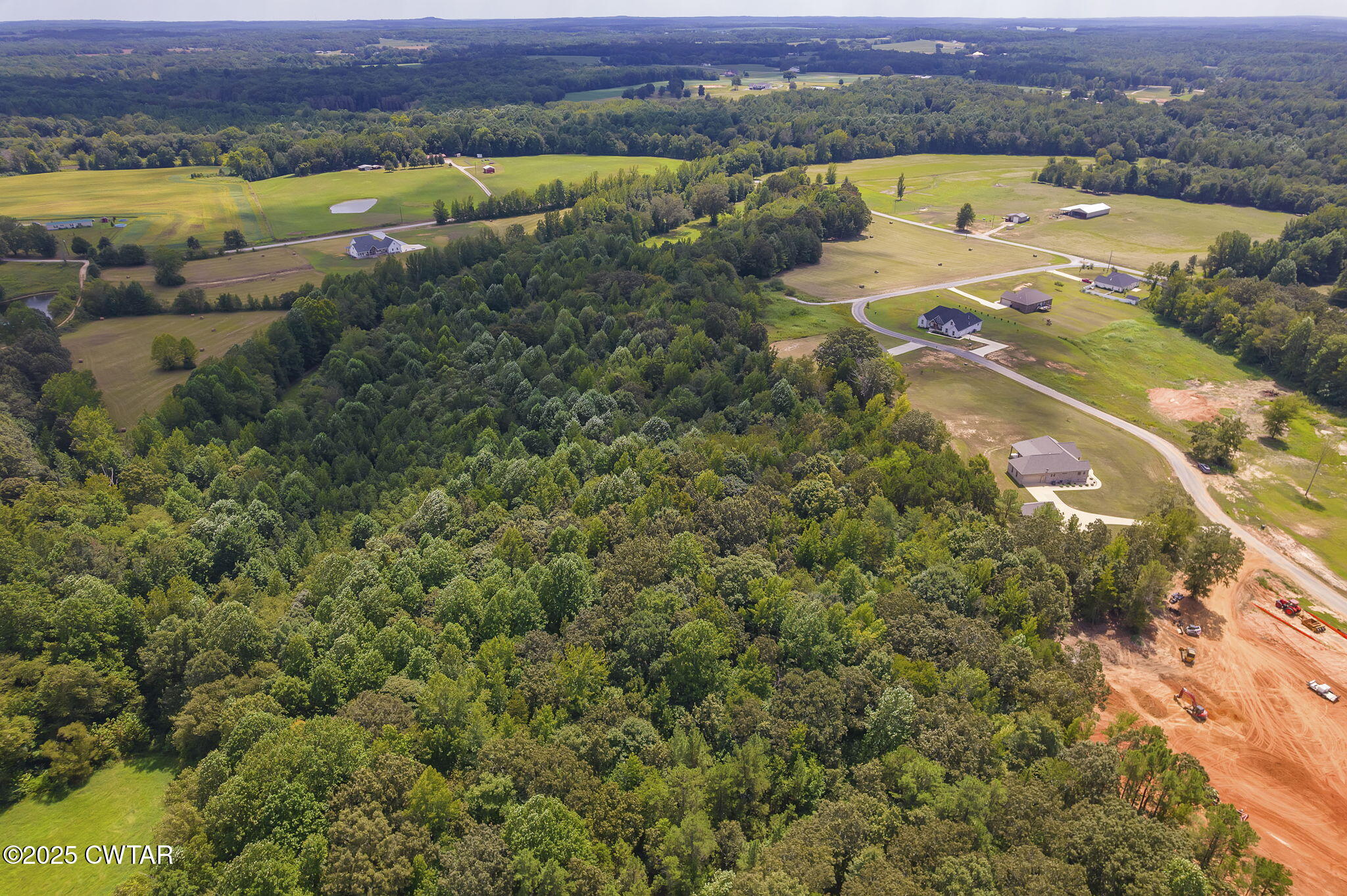 240 Greystone Cv Street Henderson, TN 38340 - Photo 59 of 64 an aerial view of residential houses with outdoor space and river