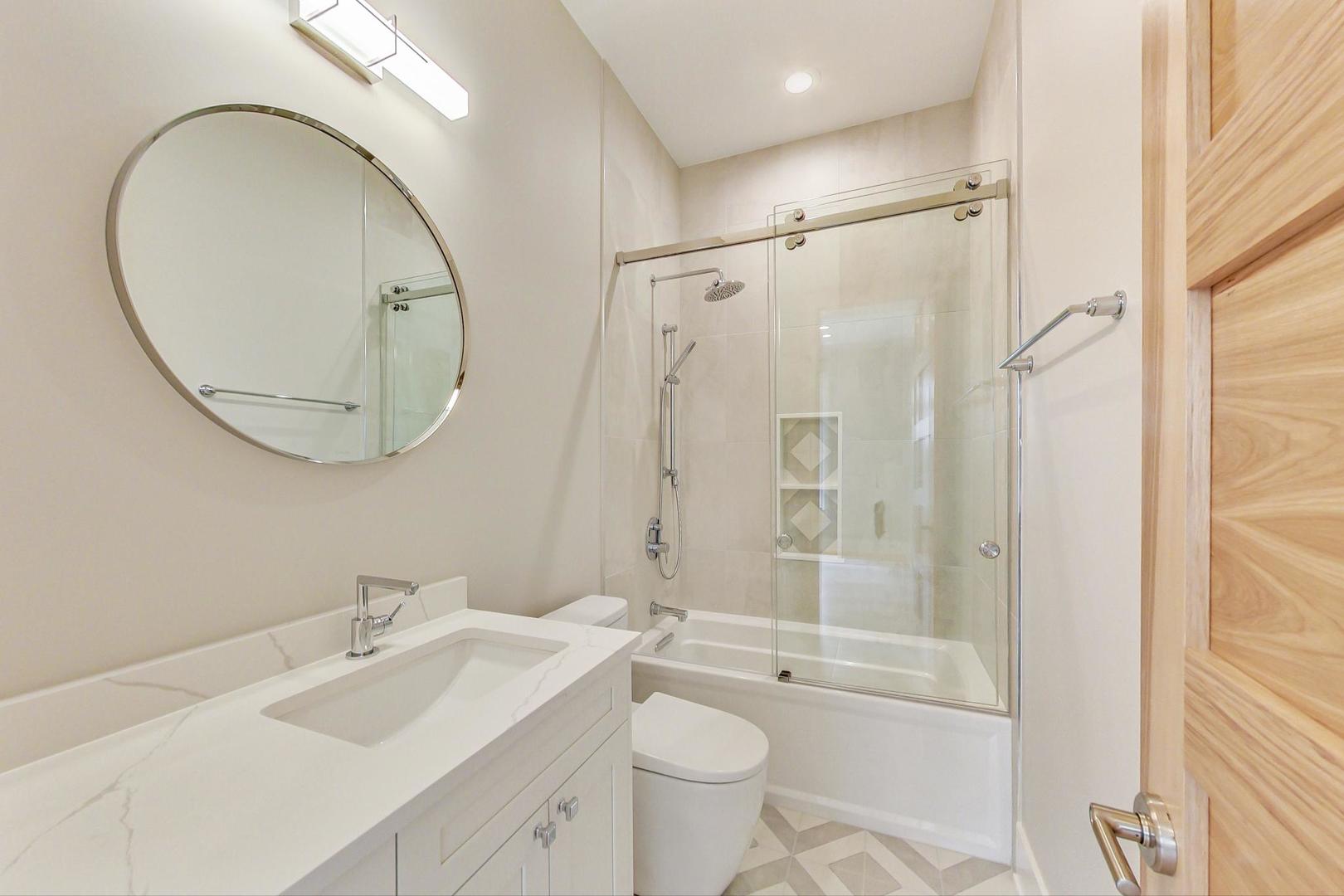 1519 Linden Circle Lemont, IL 60439 - Photo 38 of 84 a bathroom with a sink a toilet and a mirror