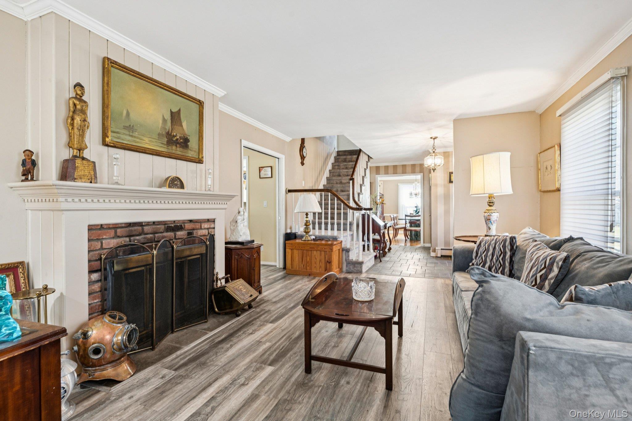 2 3 Pond Road Smithtown, NY 11787 - Photo 3 of 40 Formal Living Room with Double Sided Wood Burning Fireplace