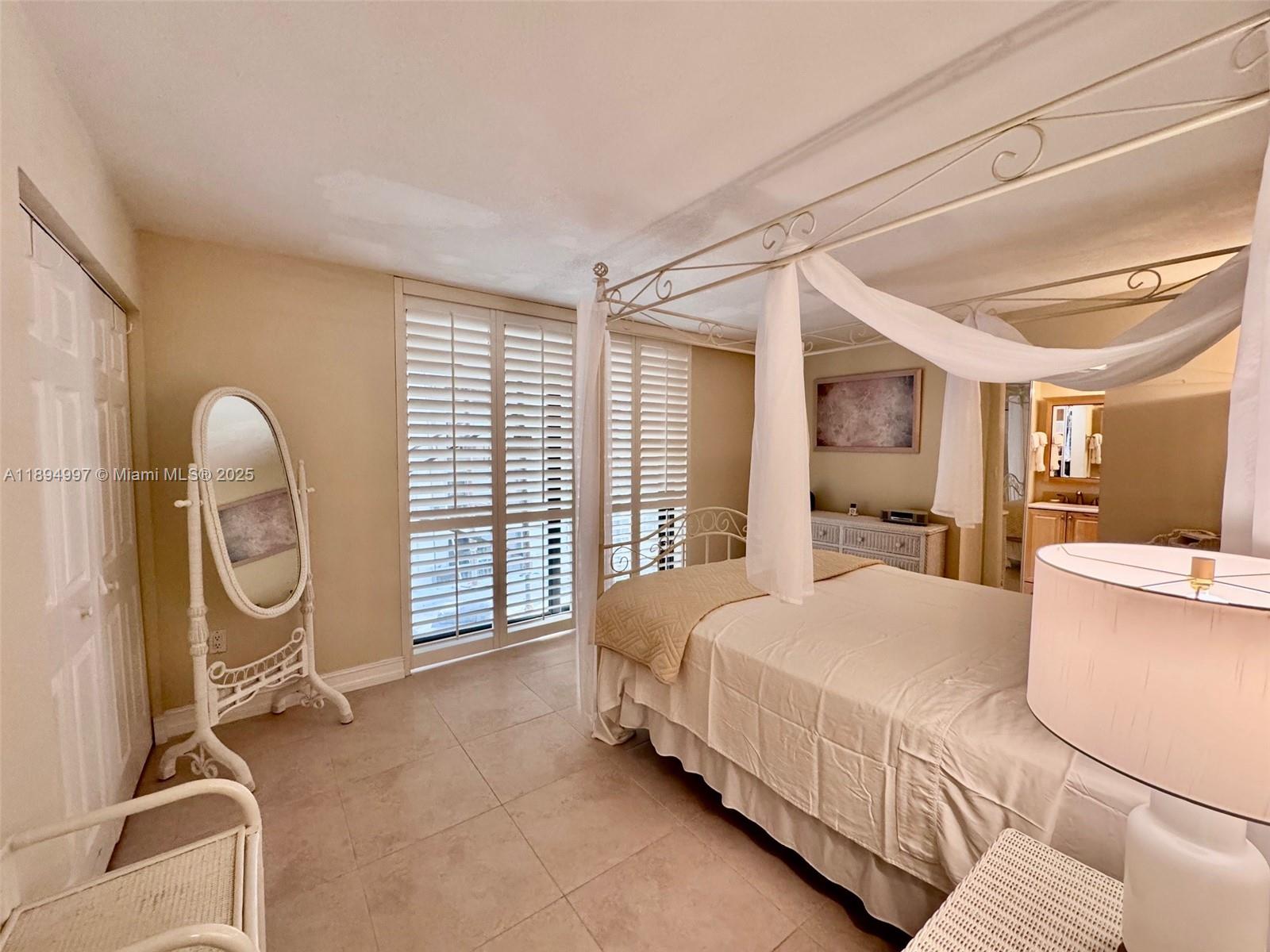 6061 Collins Avenue, Unit 10C Miami Beach, FL 33140 - Photo 13 of 45 Main Bedroom