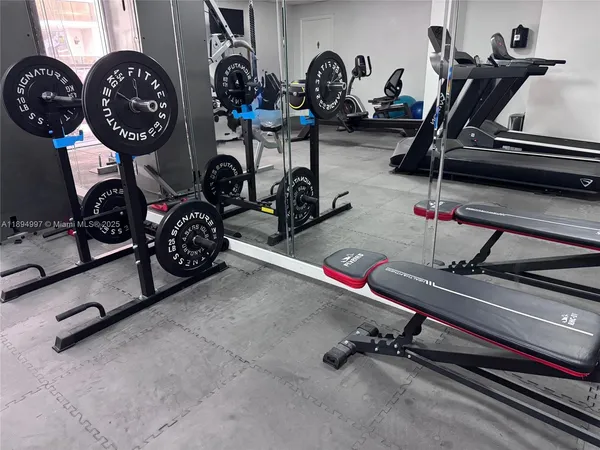a view of a room with gym equipment