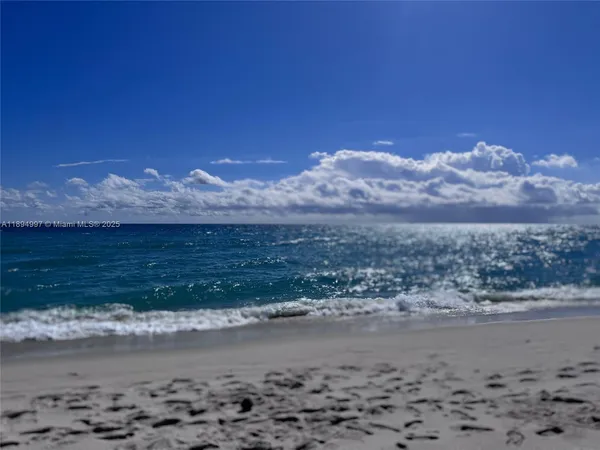 a view of a road with an ocean view