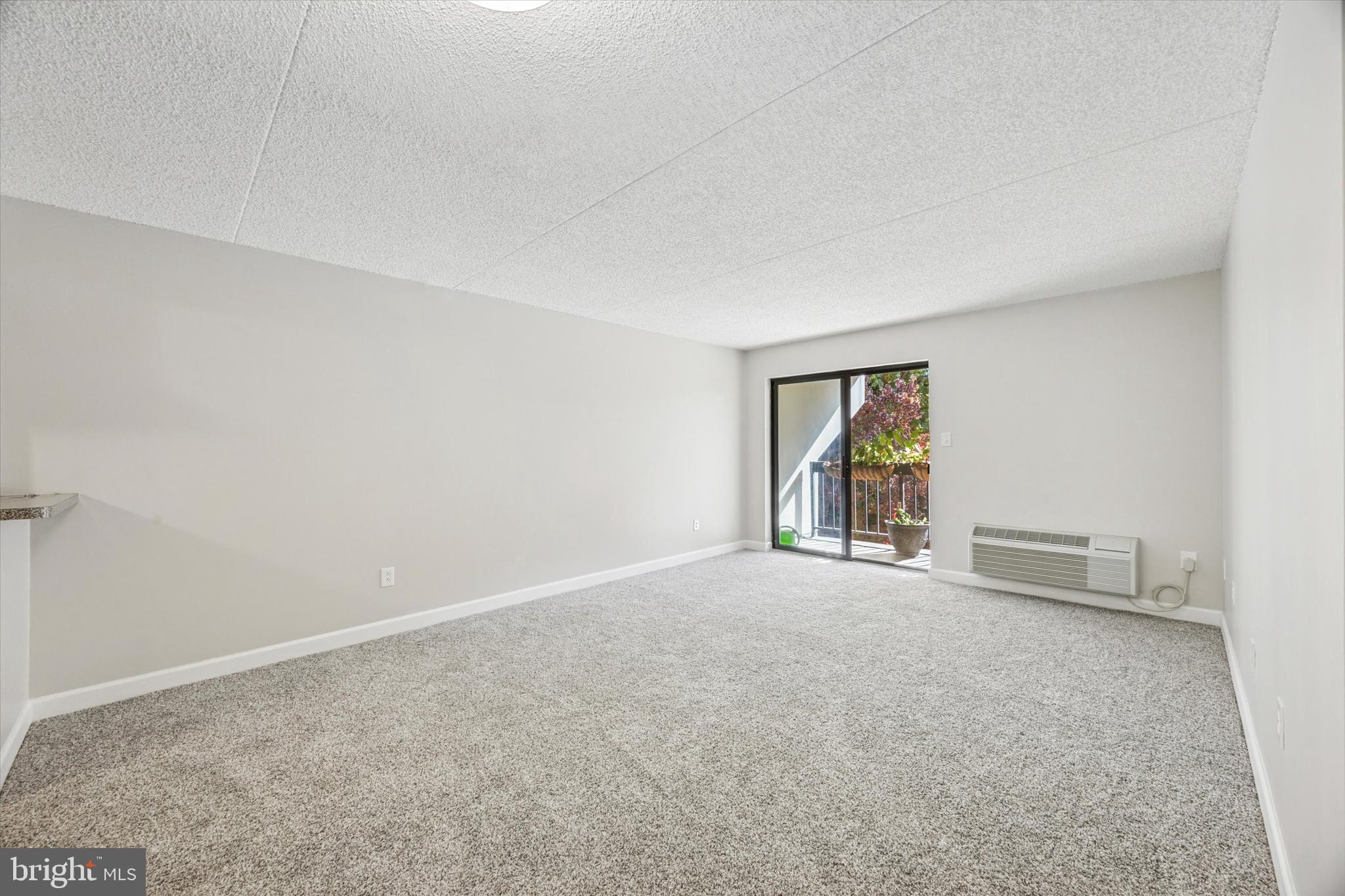 800 Avondale Road, Unit 7B Wallingford, PA 19086 - Photo 4 of 24 a view of an empty room with window