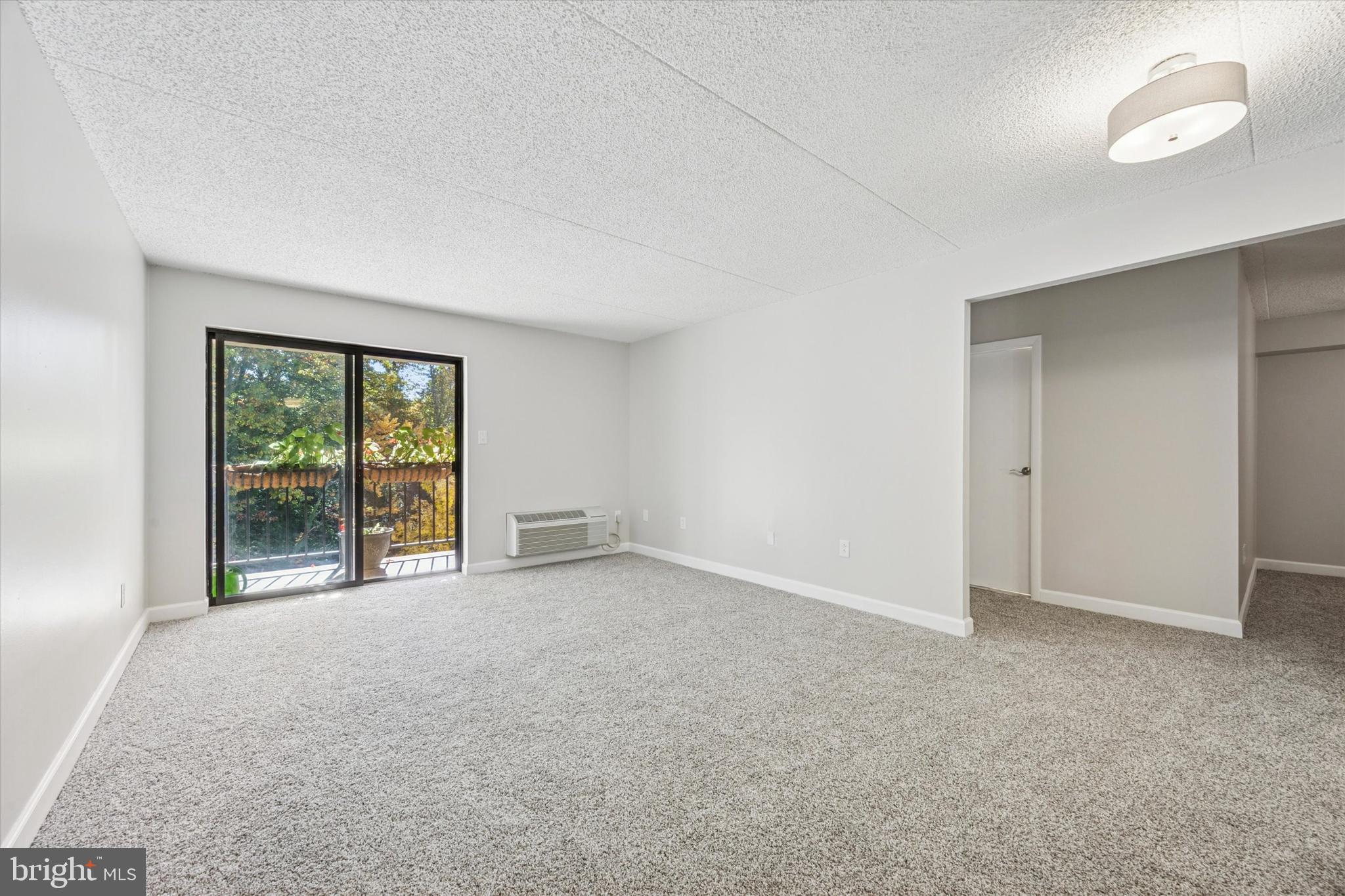 800 Avondale Road, Unit 7B Wallingford, PA 19086 - Photo 6 of 24 a view of an empty room with a window