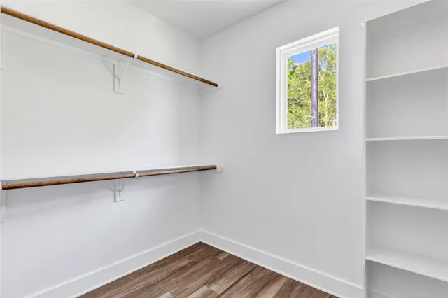 a view of an empty walk in closet