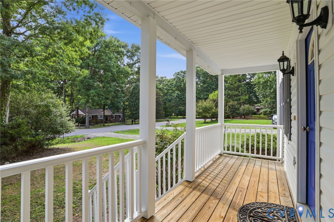 14420 Branding Iron Road Chesterfield, VA 23838 - Photo 44 of 50 Inviting covered front porch with natural wood flo