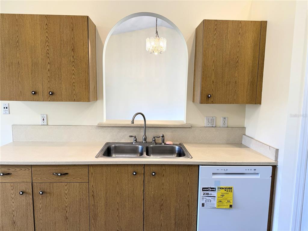 54 Westmount Lane Palm Coast, FL 32164 - Photo 18 of 32 a kitchen with a sink and cabinets