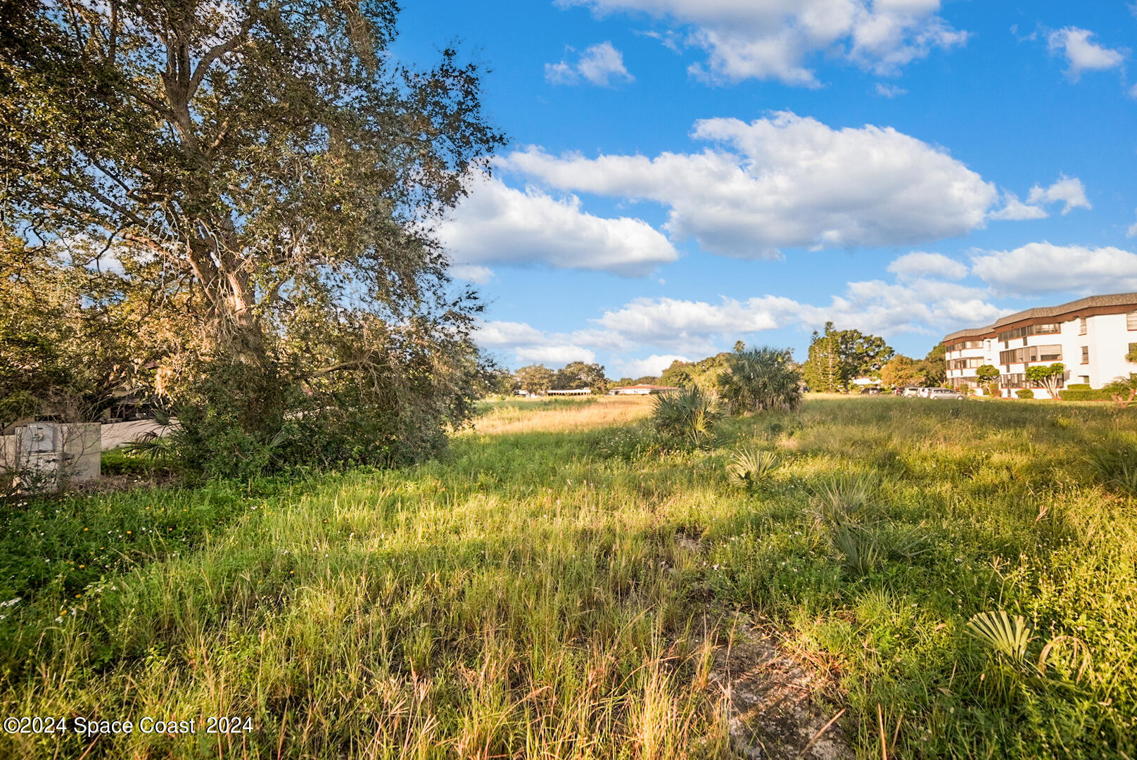 1460 Par Street Northeast Palm Bay, FL 32905 - Photo 16 of 16 a view of a lake with houses
