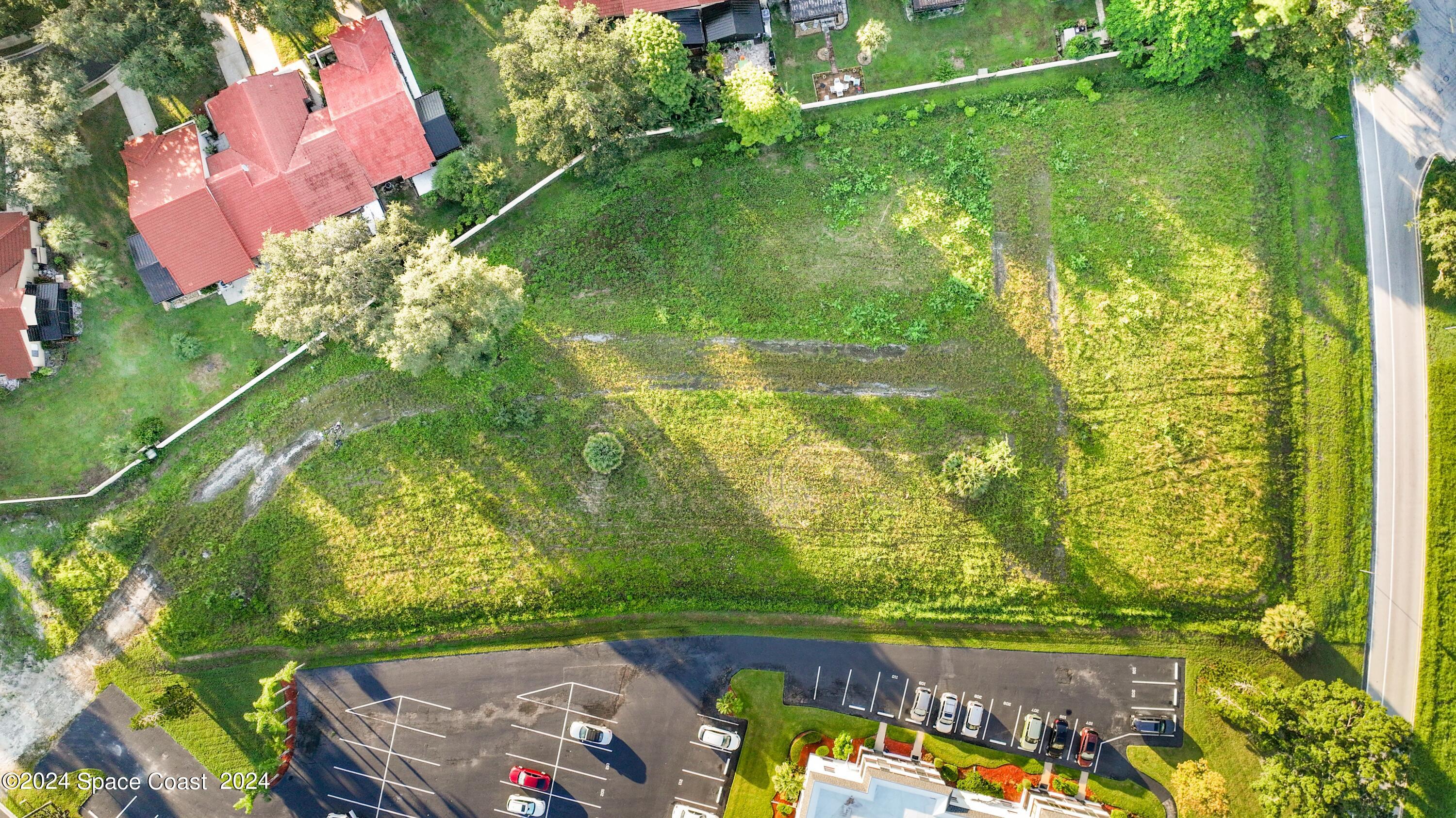 1460 Par Street Northeast Palm Bay, FL 32905 - Photo 6 of 16 view of an outdoor space and a lake view