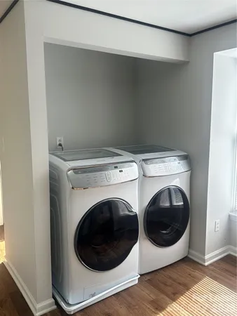 a utility room with dryer and washer