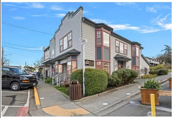 a front view of a building with street view