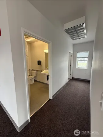a view of a room with a window
