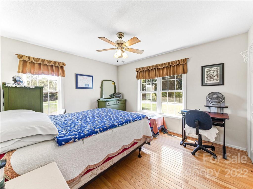 4411 Eller Ford Road Weaverville, NC 28787 - Photo 14 of 20 a bedroom with a bed and a window