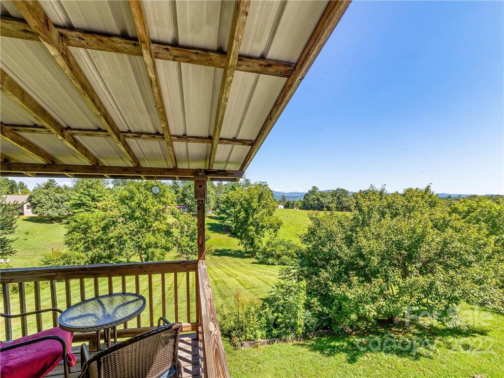 4411 Eller Ford Road Weaverville, NC 28787 - Photo 19 of 20 a view of a chairs in balcony