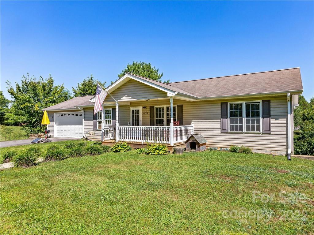 4411 Eller Ford Road Weaverville, NC 28787 - Photo 2 of 20 a view of a house with a yard