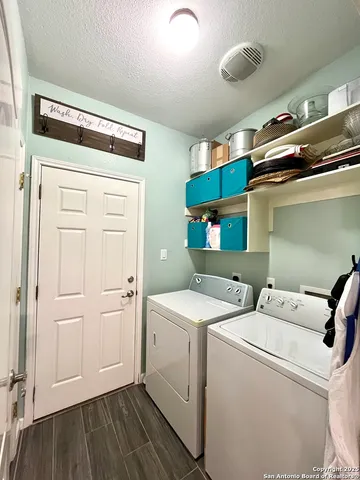 a utility room with dryer and washer